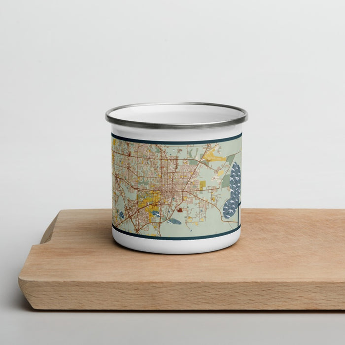 Front View Custom Gainesville Florida Map Enamel Mug in Woodblock on Cutting Board