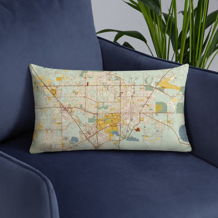 Custom Gainesville Florida Map Throw Pillow in Woodblock on Blue Colored Chair