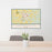 24x36 Gainesville Texas Map Print Lanscape Orientation in Woodblock Style Behind 2 Chairs Table and Potted Plant