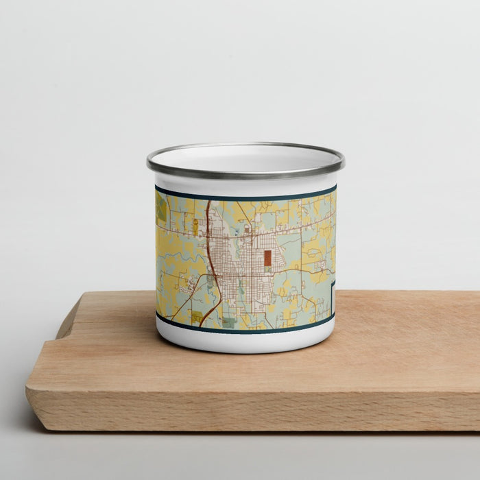 Front View Custom Gainesville Texas Map Enamel Mug in Woodblock on Cutting Board