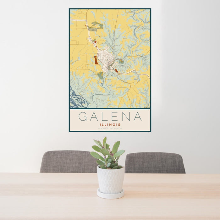 24x36 Galena Illinois Map Print Portrait Orientation in Woodblock Style Behind 2 Chairs Table and Potted Plant