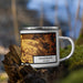 Right View Custom Galesburg Illinois Map Enamel Mug in Ember on Grass With Trees in Background