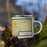 Right View Custom Galesburg Illinois Map Enamel Mug in Woodblock on Grass With Trees in Background