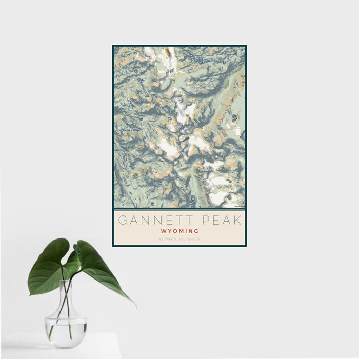16x24 Gannett Peak Wyoming Map Print Portrait Orientation in Woodblock Style With Tropical Plant Leaves in Water