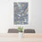 24x36 Gannett Peak Wyoming Map Print Portrait Orientation in Afternoon Style Behind 2 Chairs Table and Potted Plant
