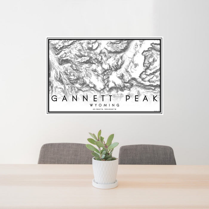 24x36 Gannett Peak Wyoming Map Print Lanscape Orientation in Classic Style Behind 2 Chairs Table and Potted Plant
