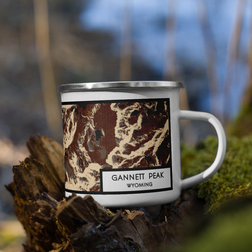 Right View Custom Gannett Peak Wyoming Map Enamel Mug in Ember on Grass With Trees in Background