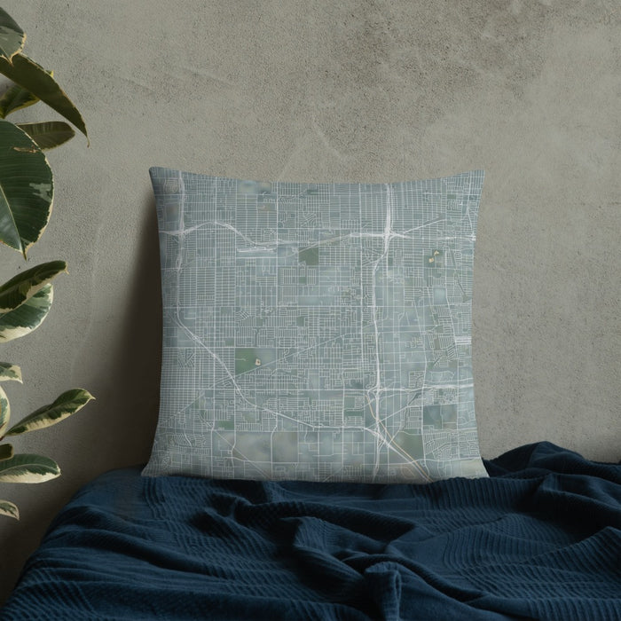 Custom Gardena California Map Throw Pillow in Afternoon on Bedding Against Wall