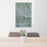 24x36 Garden City Kansas Map Print Portrait Orientation in Afternoon Style Behind 2 Chairs Table and Potted Plant