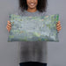 Person holding 20x12 Custom Garden City Kansas Map Throw Pillow in Afternoon