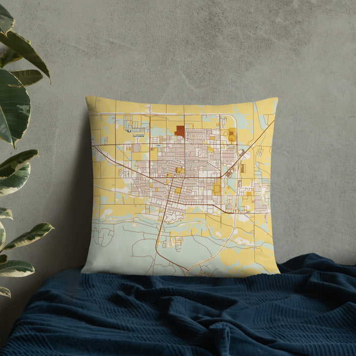Custom Garden City Kansas Map Throw Pillow in Woodblock on Bedding Against Wall