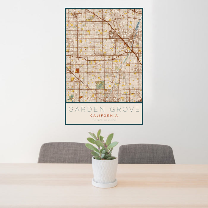24x36 Garden Grove California Map Print Portrait Orientation in Woodblock Style Behind 2 Chairs Table and Potted Plant