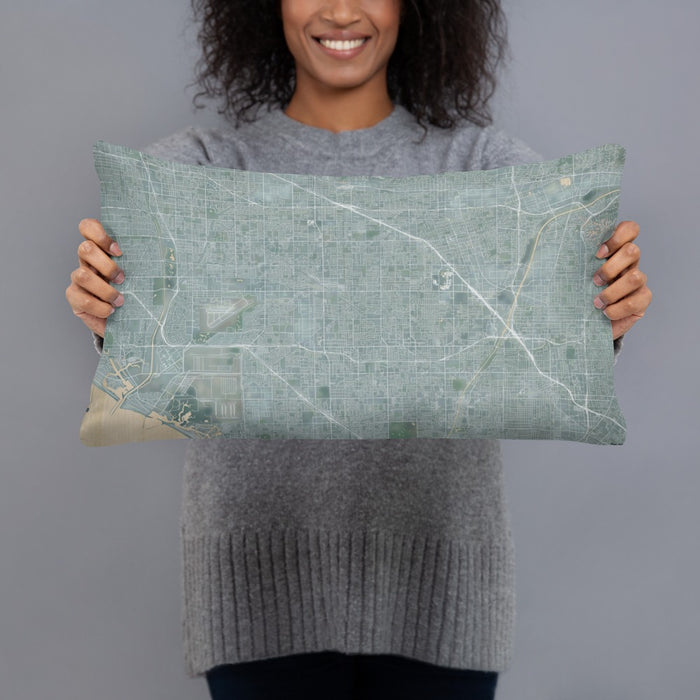 Person holding 20x12 Custom Garden Grove California Map Throw Pillow in Afternoon
