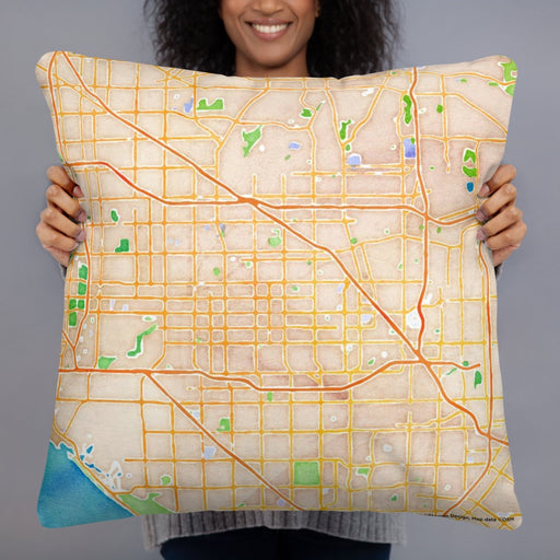 Person holding 22x22 Custom Garden Grove California Map Throw Pillow in Watercolor