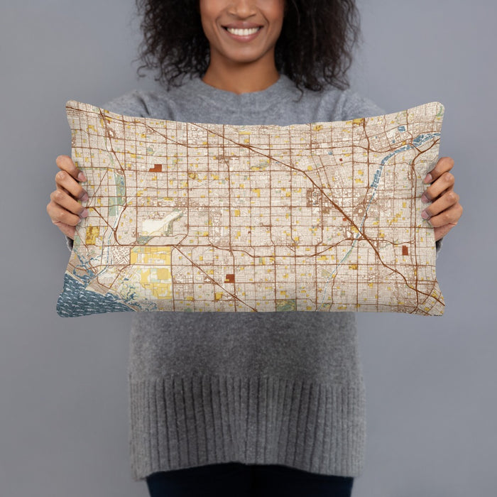 Person holding 20x12 Custom Garden Grove California Map Throw Pillow in Woodblock