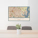 24x36 Garland Texas Map Print Lanscape Orientation in Woodblock Style Behind 2 Chairs Table and Potted Plant