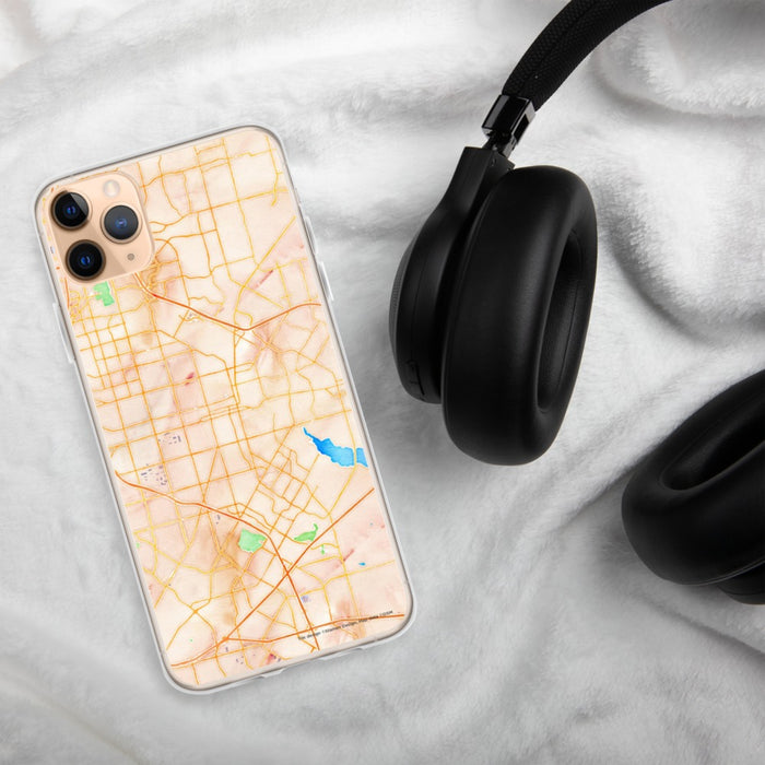 Custom Garland Texas Map Phone Case in Watercolor on Table with Black Headphones