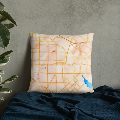 Custom Garland Texas Map Throw Pillow in Watercolor on Bedding Against Wall