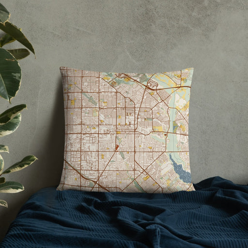Custom Garland Texas Map Throw Pillow in Woodblock on Bedding Against Wall