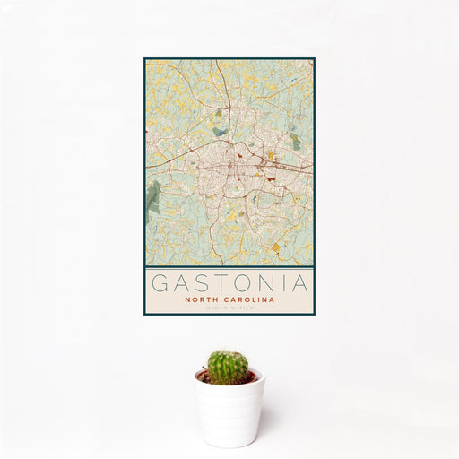 12x18 Gastonia North Carolina Map Print Portrait Orientation in Woodblock Style With Small Cactus Plant in White Planter