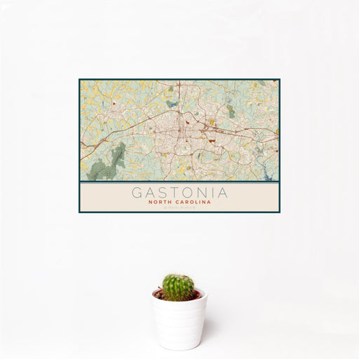 12x18 Gastonia North Carolina Map Print Landscape Orientation in Woodblock Style With Small Cactus Plant in White Planter