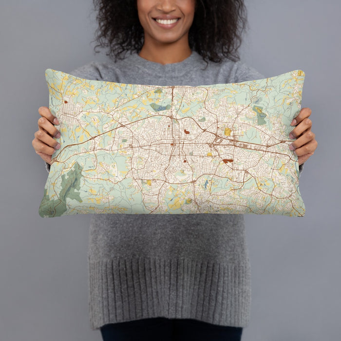 Person holding 20x12 Custom Gastonia North Carolina Map Throw Pillow in Woodblock