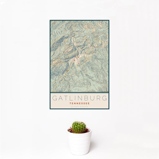 12x18 Gatlinburg Tennessee Map Print Portrait Orientation in Woodblock Style With Small Cactus Plant in White Planter