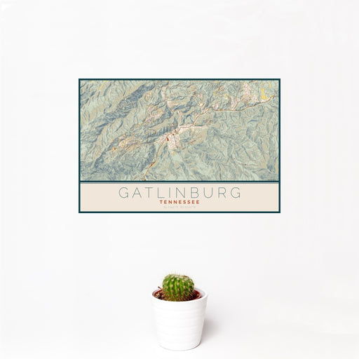 12x18 Gatlinburg Tennessee Map Print Landscape Orientation in Woodblock Style With Small Cactus Plant in White Planter
