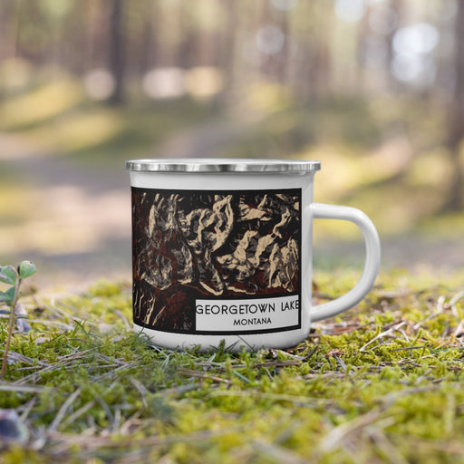 Right View Custom Georgetown Lake Montana Map Enamel Mug in Ember on Grass With Trees in Background