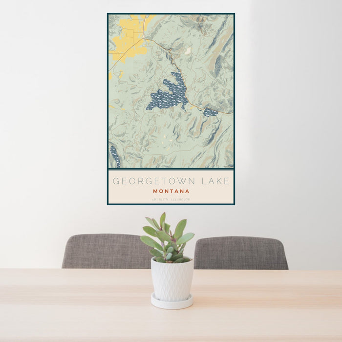 24x36 Georgetown Lake Montana Map Print Portrait Orientation in Woodblock Style Behind 2 Chairs Table and Potted Plant