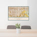 24x36 Gilbert Arizona Map Print Lanscape Orientation in Woodblock Style Behind 2 Chairs Table and Potted Plant