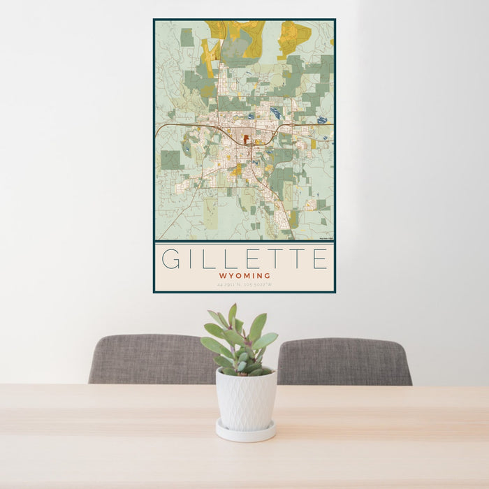 24x36 Gillette Wyoming Map Print Portrait Orientation in Woodblock Style Behind 2 Chairs Table and Potted Plant