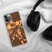 Custom Gillette Wyoming Map Phone Case in Ember on Table with Black Headphones