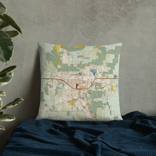 Custom Gillette Wyoming Map Throw Pillow in Woodblock on Bedding Against Wall