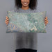 Person holding 20x12 Custom Gilroy California Map Throw Pillow in Afternoon