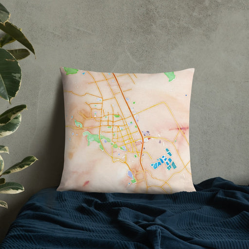Custom Gilroy California Map Throw Pillow in Watercolor on Bedding Against Wall