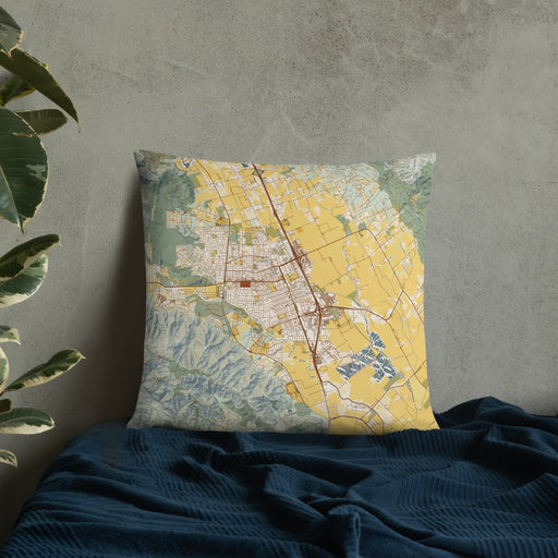 Custom Gilroy California Map Throw Pillow in Woodblock on Bedding Against Wall