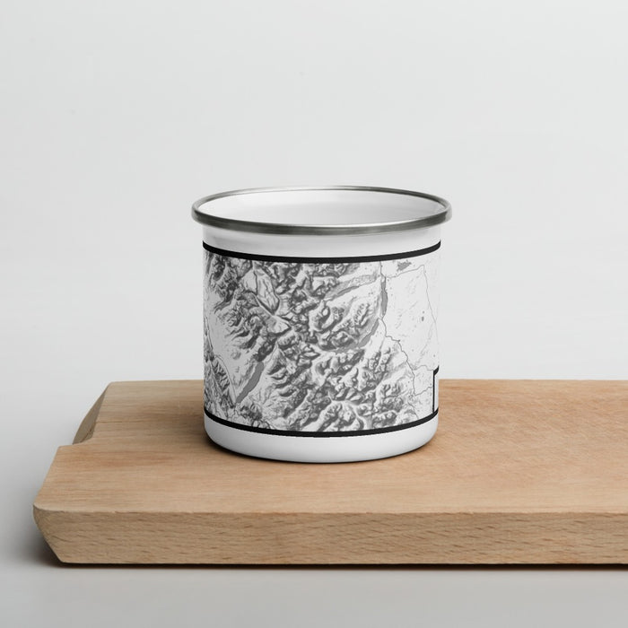 Front View Custom Glacier National Park Map Enamel Mug in Classic on Cutting Board