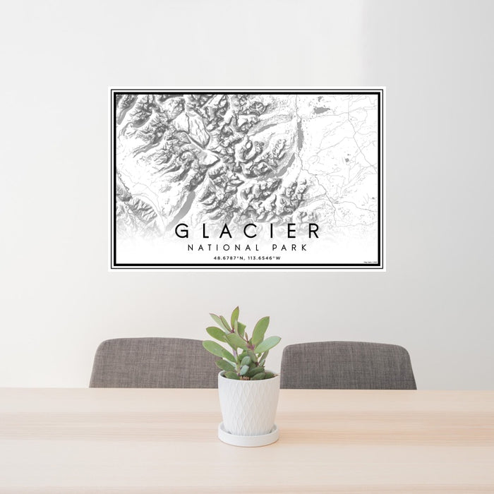 24x36 Glacier National Park Map Print Landscape Orientation in Classic Style Behind 2 Chairs Table and Potted Plant