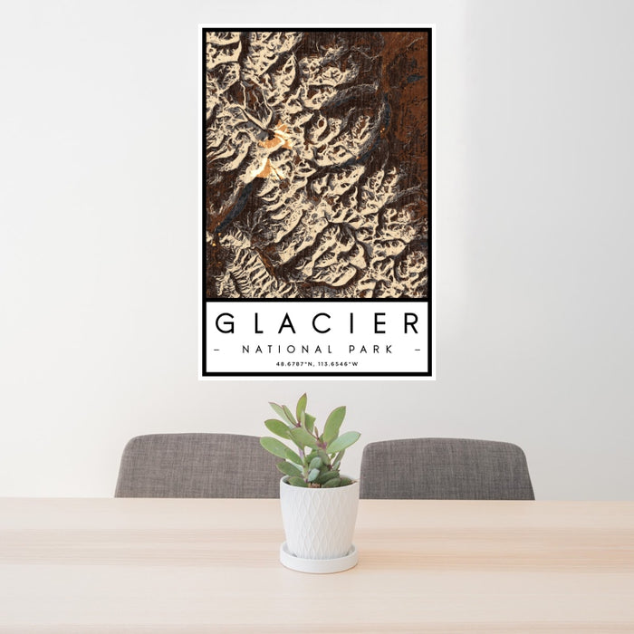24x36 Glacier National Park Map Print Portrait Orientation in Ember Style Behind 2 Chairs Table and Potted Plant