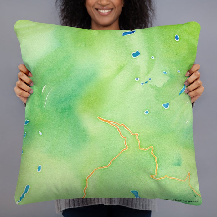 Person holding 22x22 Custom Glacier National Park Map Throw Pillow in Watercolor
