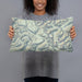 Person holding 20x12 Custom Glacier National Park Map Throw Pillow in Woodblock