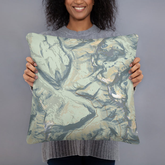 Person holding 18x18 Custom Glacier National Park Map Throw Pillow in Woodblock