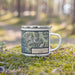 Right View Custom Glacier Bay Alaska Map Enamel Mug in Woodblock on Grass With Trees in Background