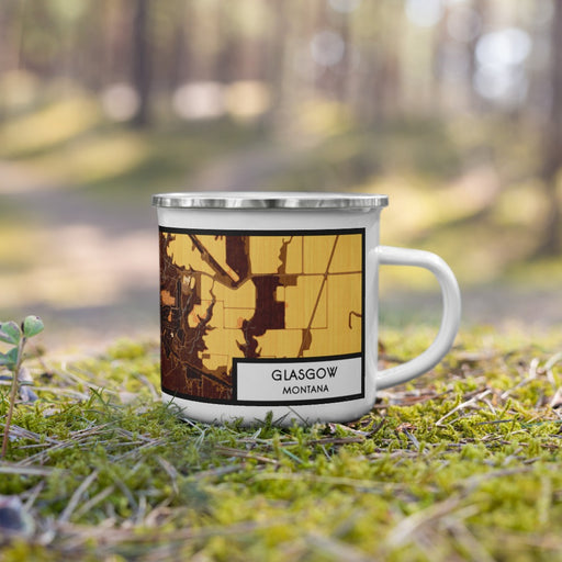 Right View Custom Glasgow Montana Map Enamel Mug in Ember on Grass With Trees in Background