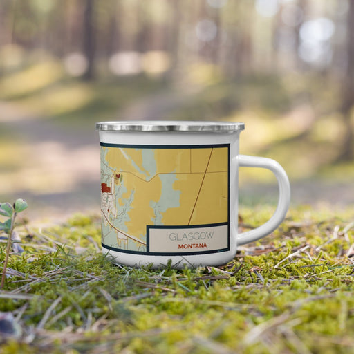 Right View Custom Glasgow Montana Map Enamel Mug in Woodblock on Grass With Trees in Background