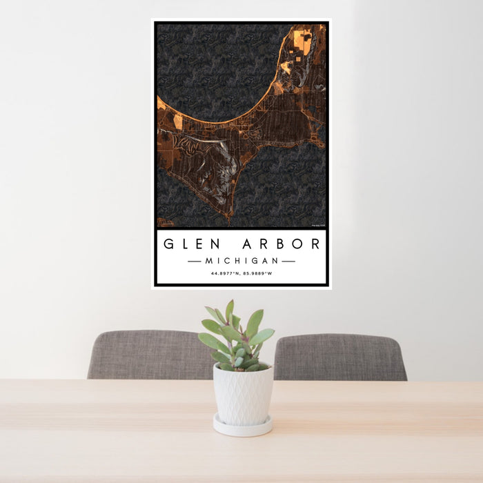 24x36 Glen Arbor Michigan Map Print Portrait Orientation in Ember Style Behind 2 Chairs Table and Potted Plant