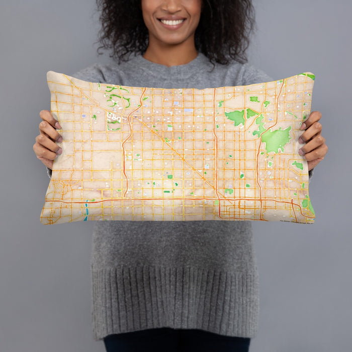 Person holding 20x12 Custom Glendale Arizona Map Throw Pillow in Watercolor