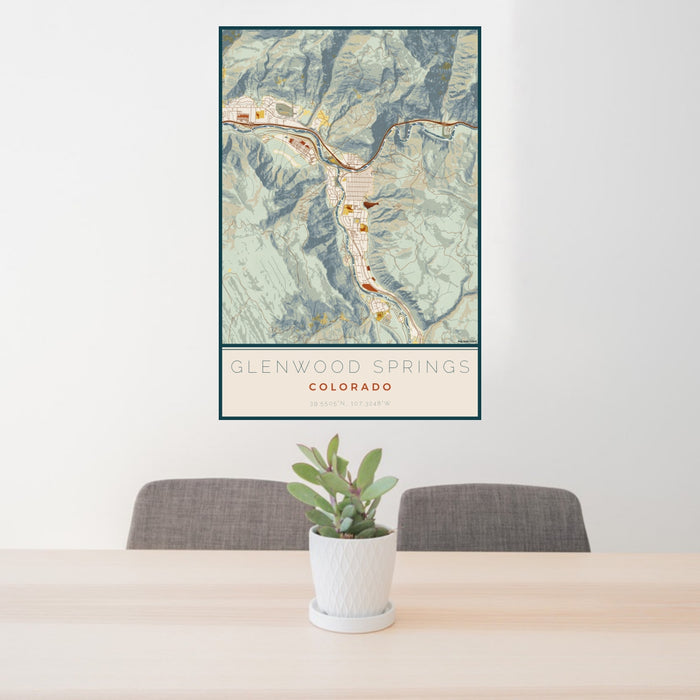 24x36 Glenwood Springs Colorado Map Print Portrait Orientation in Woodblock Style Behind 2 Chairs Table and Potted Plant