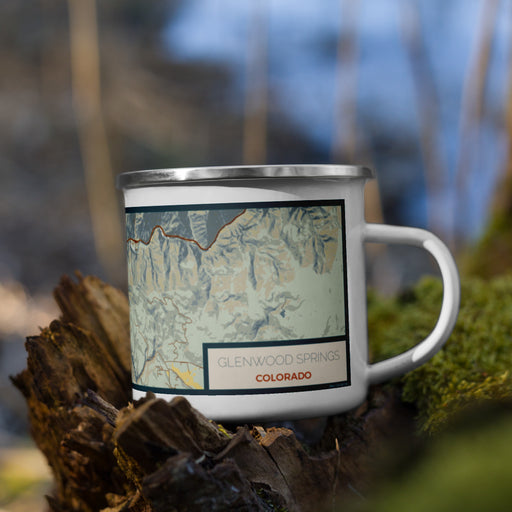 Right View Custom Glenwood Springs Colorado Map Enamel Mug in Woodblock on Grass With Trees in Background